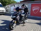 Скутер Omaks 125